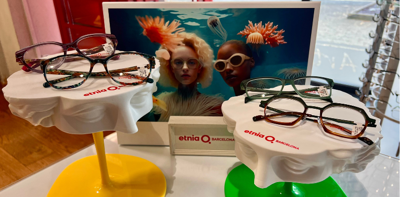 Colourful Etnia Barcelona glasses displayed in an optician’s practice