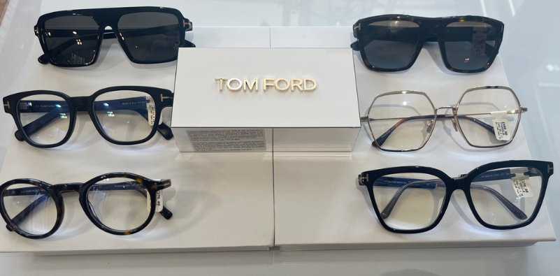A display of a selection of Tom Ford men’s and women’s glasses and sunglasses.